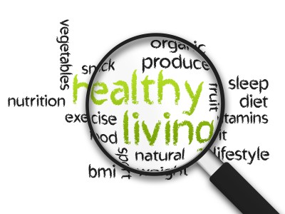 Illustration of a magnifying glass zooming in on the words "healthy living"